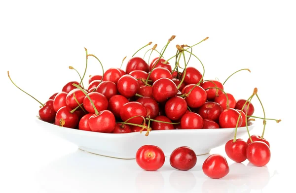 Cerises sur plaque isolée sur blanc — Photo