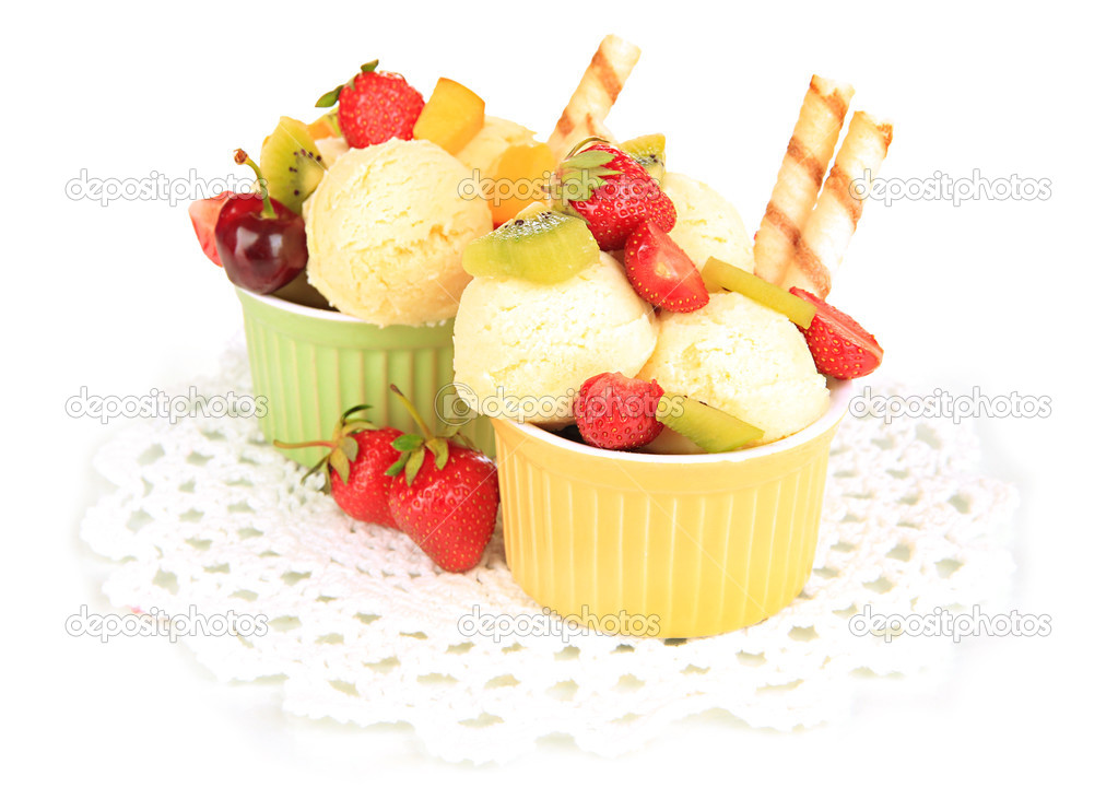 Delicious ice cream with fruits and berries in bowl isolated on white