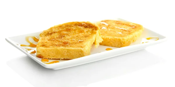 Wit brood toast met honing op plaat, geïsoleerd op wit — Stockfoto