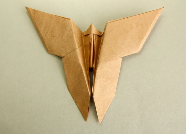 Origami motyla na szarym tle — Zdjęcie stockowe