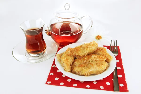 Sweet baklava on plate isolated on white — Stock Photo, Image