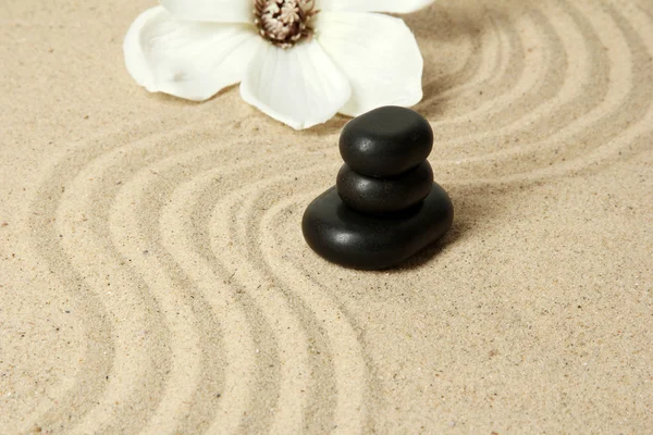 Zen garden with raked sand and round stones close up — Stock Photo, Image