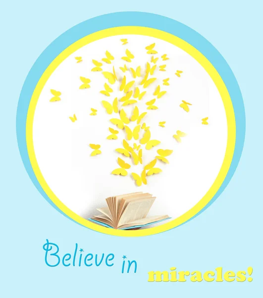 Paper yellow butterflies fly out of book — Stock Photo, Image