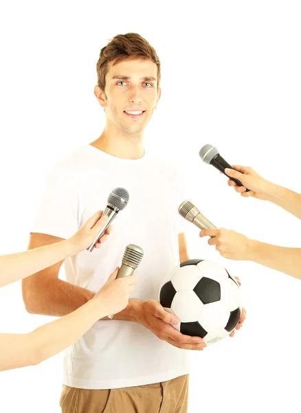 Interview with a young soccer player, isolated on white — ストック写真