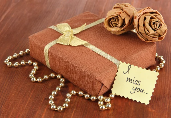 Romantic parcel on wooden background — Stock Photo, Image