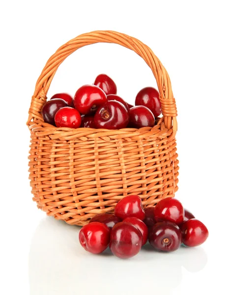 Cherry berries in wicker basket isolated on white — Stock Photo, Image