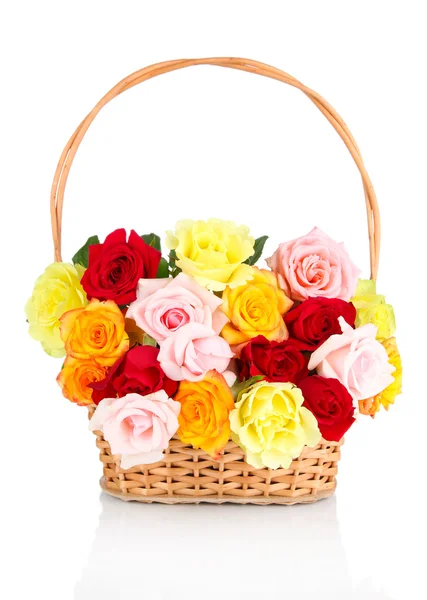 Beautiful bouquet of roses in wicker basket isolated on white — Stock Photo, Image