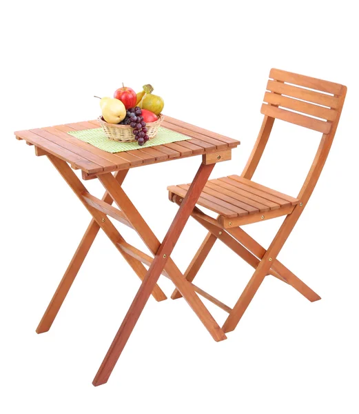 Wooden table with fruit isolated on white — Stock Photo, Image