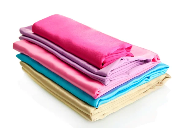 Heap of cloth fabrics isolated on white — Stock Photo, Image