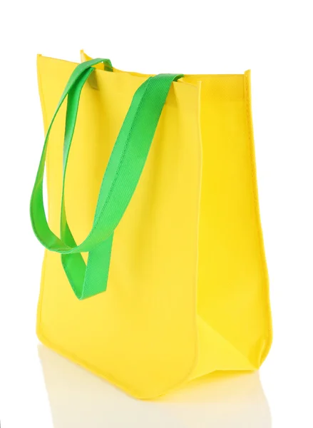 与绿色手柄上惠特孤立的黄色袋子 — 图库照片