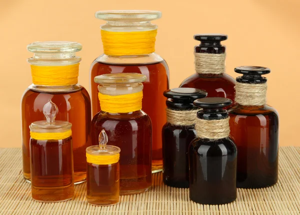 Medicine bottles on beige background — Stock Photo, Image