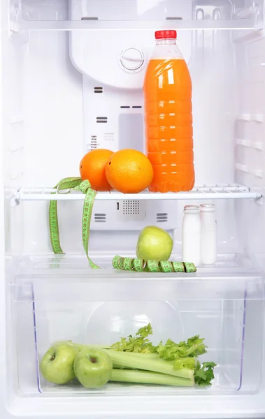 Open refrigerator with diet food — Stock Photo, Image