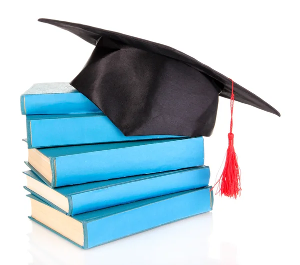 Grad hat with books isolated on white — Stock Photo, Image