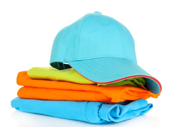 Blue peaked cap with T-shirts isolated on white — Stock Photo, Image