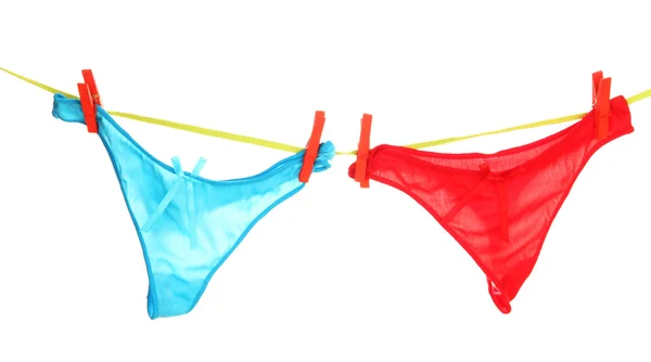 Women's panties hanging on rope isolated on white — Stock Photo, Image