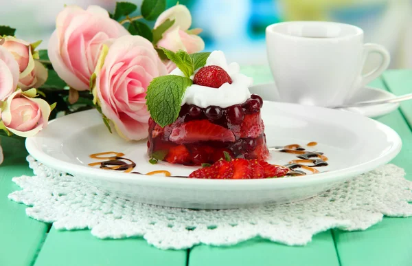 Tasty jelly dessert with fresh berries, on bright background — Stock Photo, Image