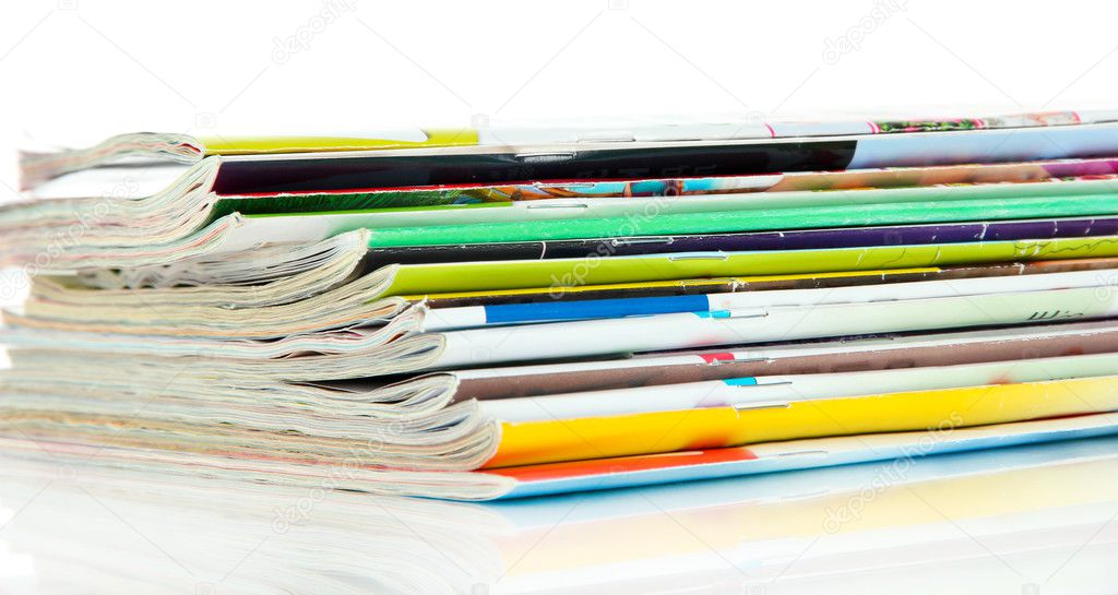 Many magazines isolated on white