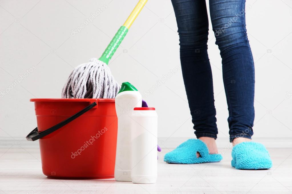Cleaning floor in room close-up