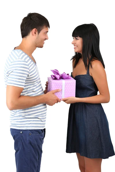 Beautiful loving couple with gift isolated on white — Stock Photo, Image