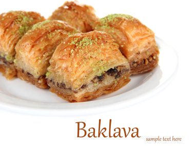 plaka üzerinde beyaz izole tatlı baklava