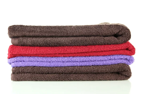 Montón de toallas de colores, aislado en blanco —  Fotos de Stock