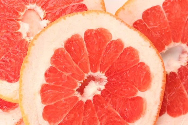 Грэйпфрутовые ломтики фона — стоковое фото