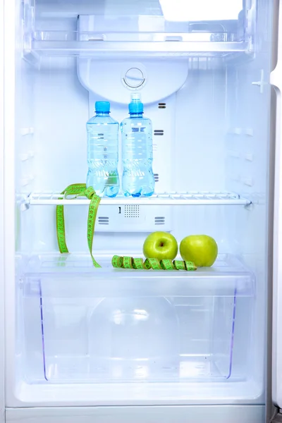 Open refrigerator with diet food