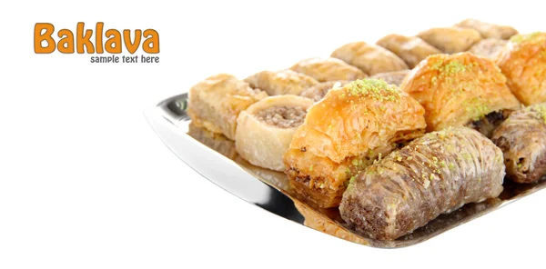 Baklava dulce en bandeja aislada en blanco — Foto de Stock