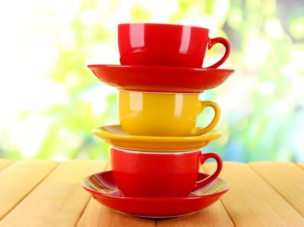 Three cups on nature background — Stock Photo, Image