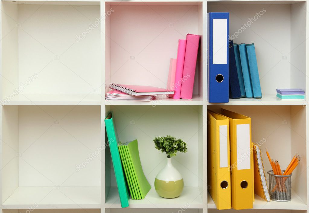 White office shelves with different stationery, close up ⬇ Stock Photo
