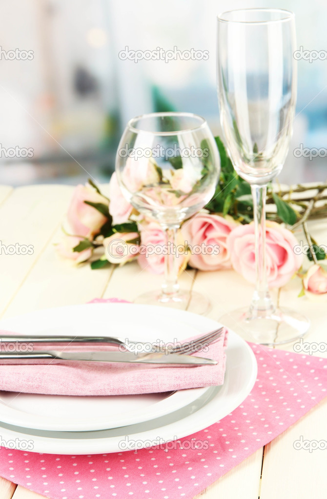 Table serving on a wooden background on the background of the room