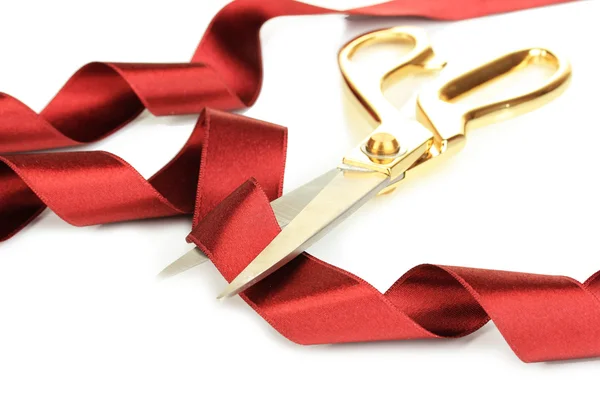 Satin ribbon curled around scissors isolated on white — Stock Photo, Image