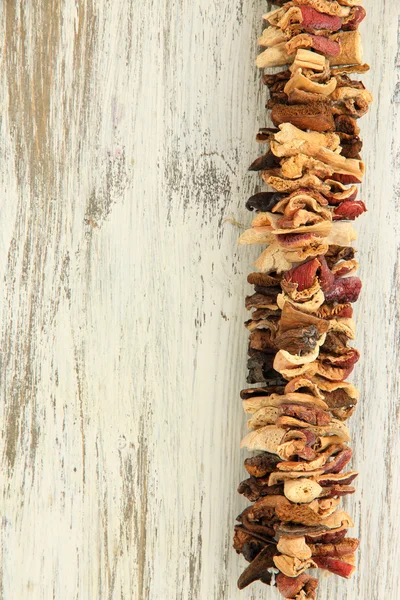 Dried mushrooms on wooden background — Stock Photo, Image