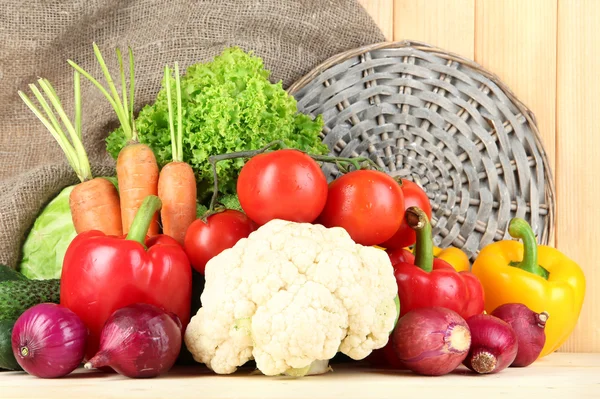 Fresh vegetables on wooden table close up — Stock Photo, Image