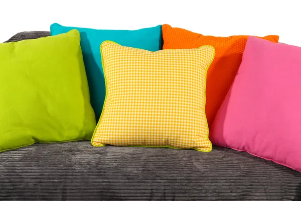 Colorful pillows on couch isolated on white — Stock Photo, Image