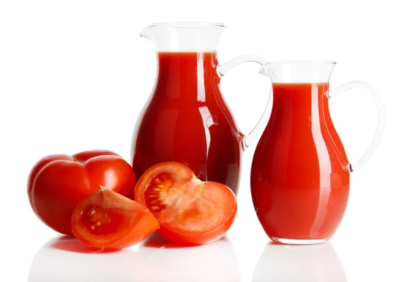 Tomato juice in pitchers isolated on white — Stock Photo, Image