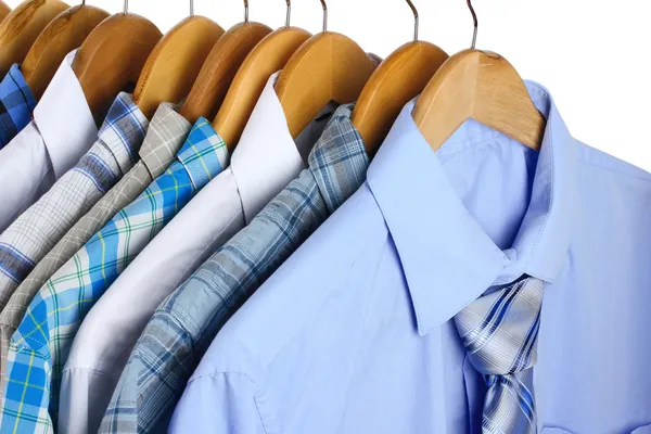 Shirts with ties on wooden hangers close-up — Stock Photo, Image