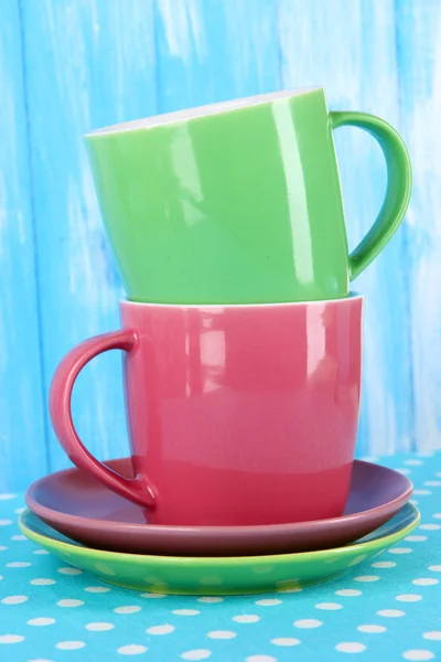 Two cups on blue background — Stock Photo, Image