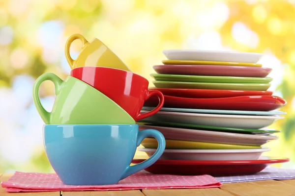 Mountains colorful dishes on napkins on nature background — Stock Photo, Image