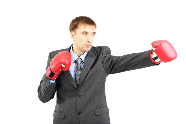 Hombre de negocios en guantes de boxeo aislados en blanco — Foto de Stock