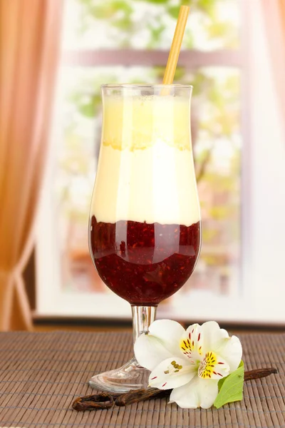 Delicious fruit smoothie on window background — Stock Photo, Image