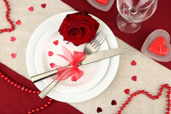 Table setting in honor of Valentine's Day close-up Royalty Free Stock Images