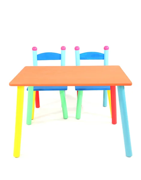 Pequeña y colorida mesa y sillas para niños pequeños aislados en blanco —  Fotos de Stock