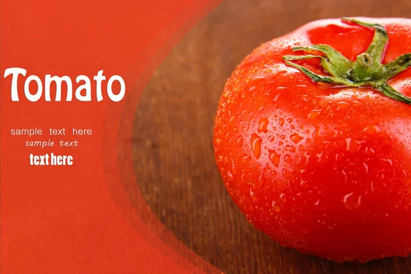Fresh tomato on wooden background — Stock Photo, Image
