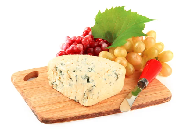 Tasty blue cheese and grape on cutting board, isolated on white — Stock Photo, Image