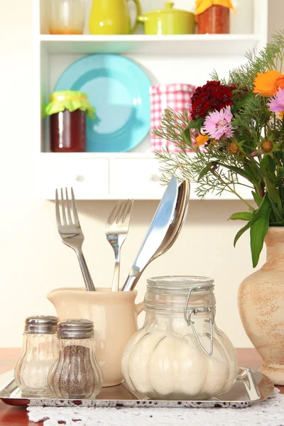 Kitchen composition on table on shelf background — Stock Photo, Image