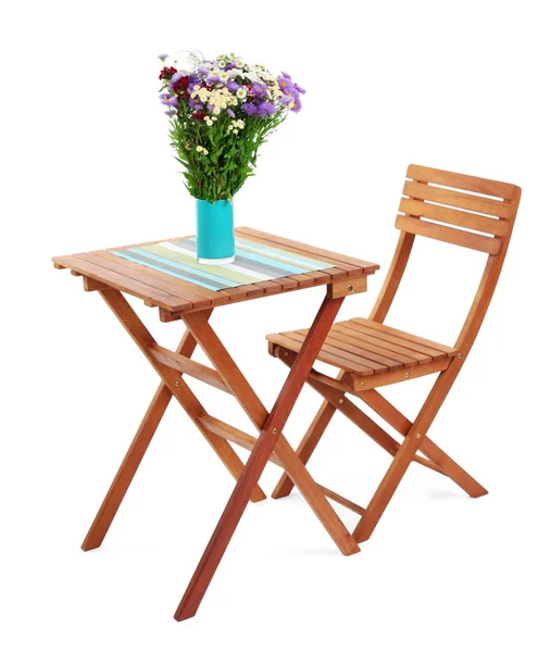 Mesa de madera con flor aislada en blanco — Foto de Stock