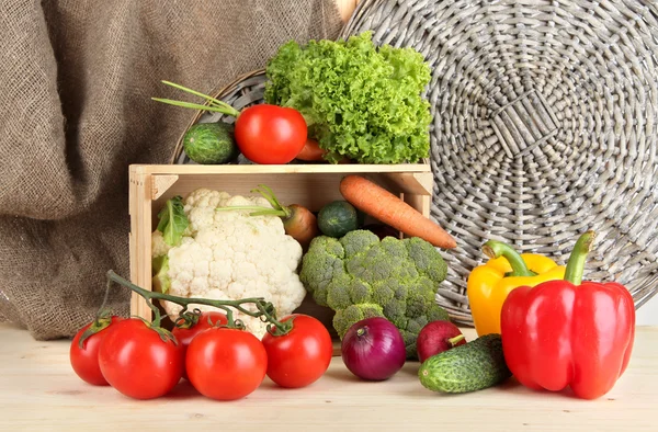 Fresh vegetables in wooden box on table close up — Stock Photo, Image