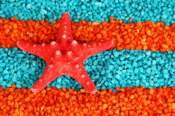 Starfish on colorful crystals of sea salt background — Stock Photo, Image