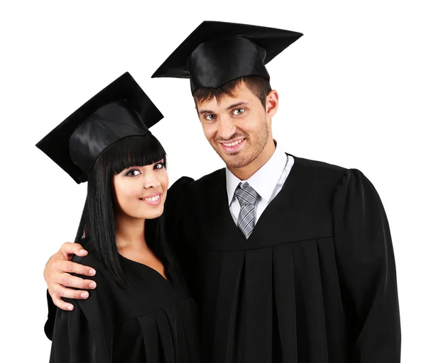 Dois estudantes graduados felizes isolados em branco — Fotografia de Stock